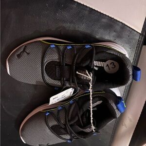 Puma Kids Black Sneakers with Blue Highlights